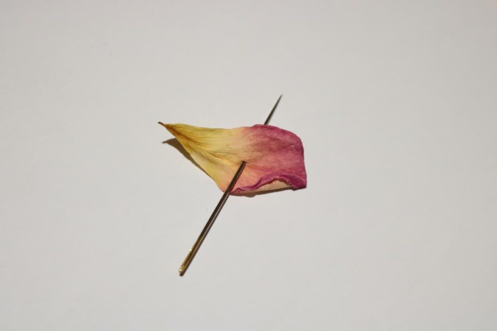 needle with rose petal on it https://www.b4andafters.com/rose-petal-garland