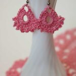 two pink crocheted earrings