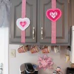 felt filigree hearts on kitchen cupboard doors