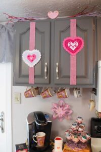felt filigree hearts on kitchen cupboard doors