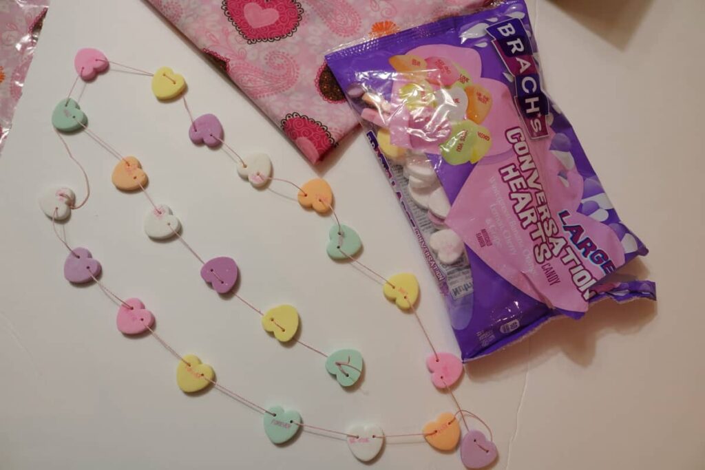 conversation heart garland and bag of candy https://www.b4andafters.com/conversation-heart-garland