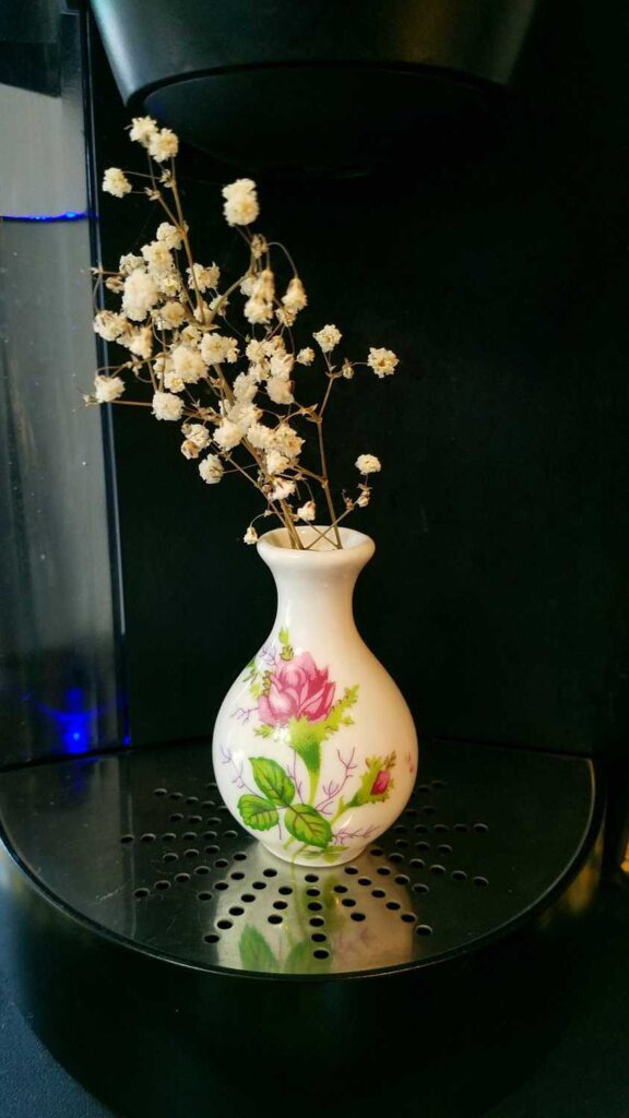 miniature vase with baby's breath flowers