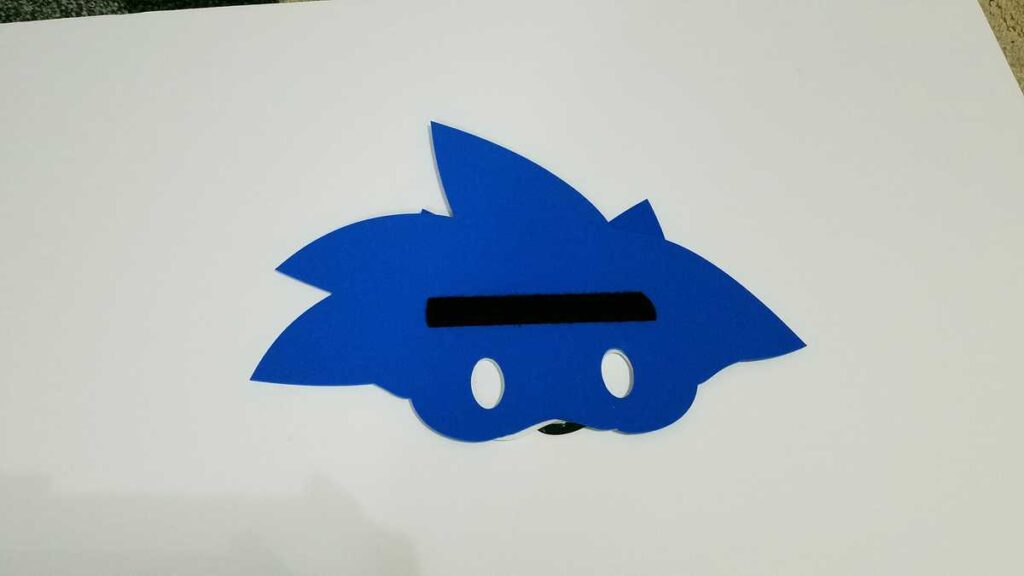 back of blue Sonic mask with piece of black velcro attached to it.