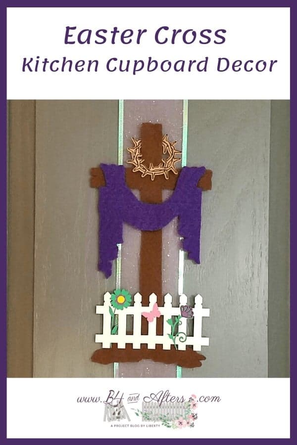 Easter Felt Cross with purple robe draped, on a kitchen cupboard door