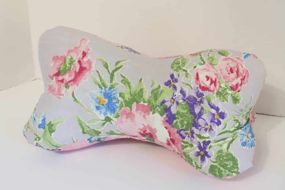 purple floral bone shaped travel pillow