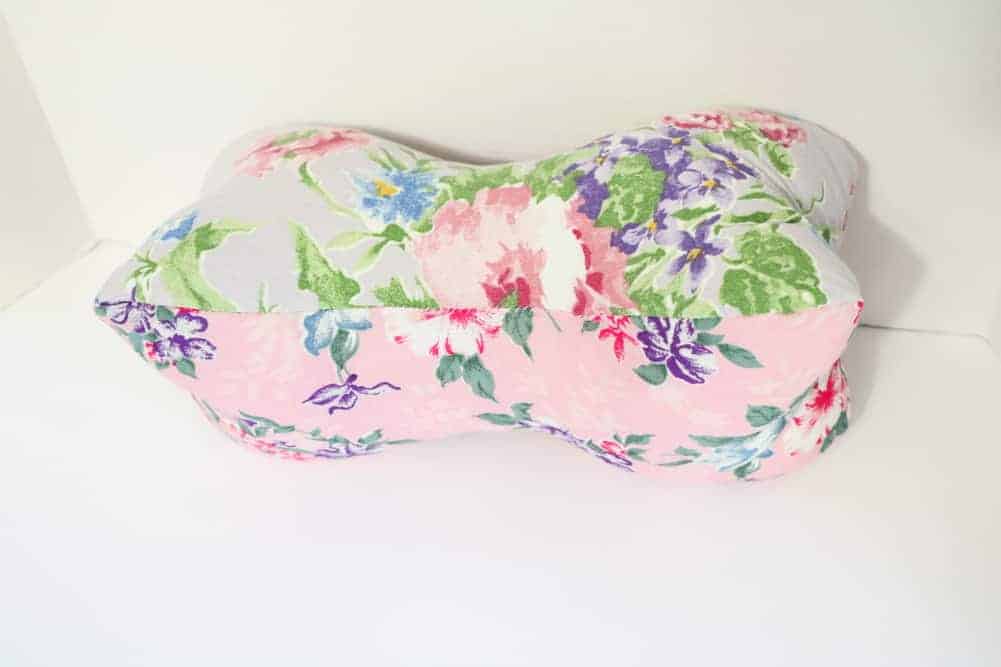 pink floral bone shaped travel pillow