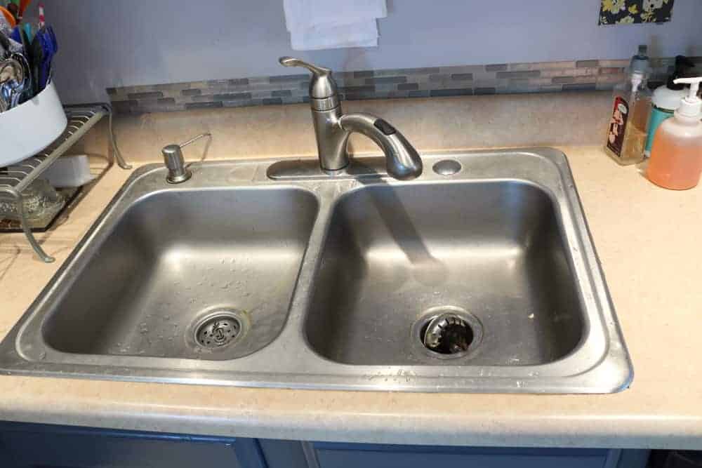old kitchen sink and faucet