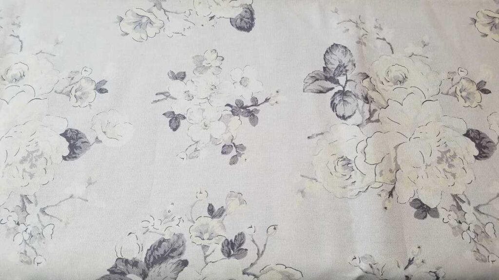 gray and white flower patterned fabric