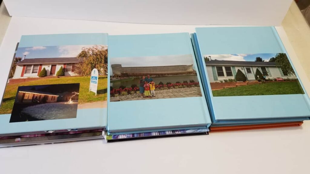 back covers of 3 photo books