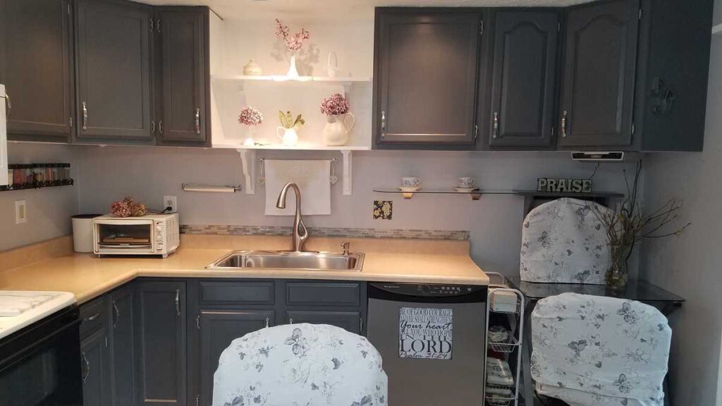 horizontal view of kitchen sink and desk corner