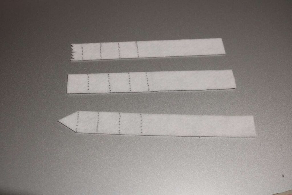 strips of white felt for toilet paper
