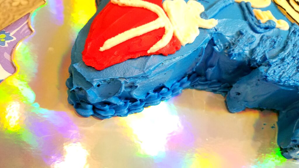 closeup of shoe on sonic cake