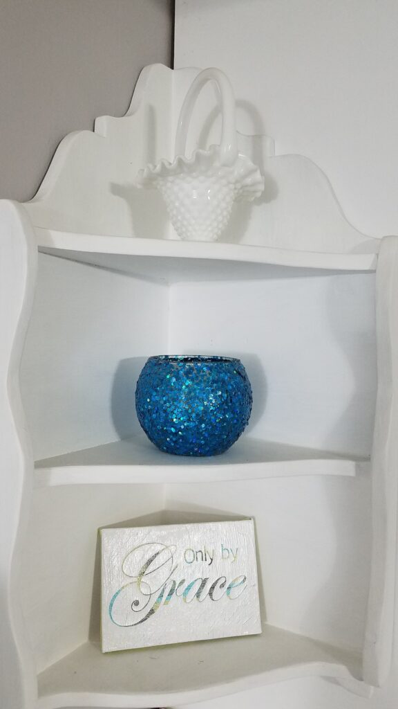 closeup of corner knick knack shelf