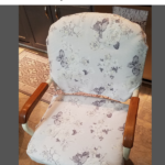 gray and white floral slipcover on a kitchen chair