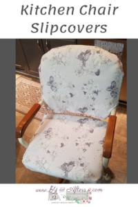 gray and white floral slipcover on a kitchen chair