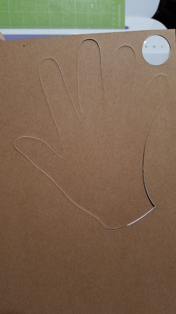 back of chipboard hand not quite cut all the way through the chipboard