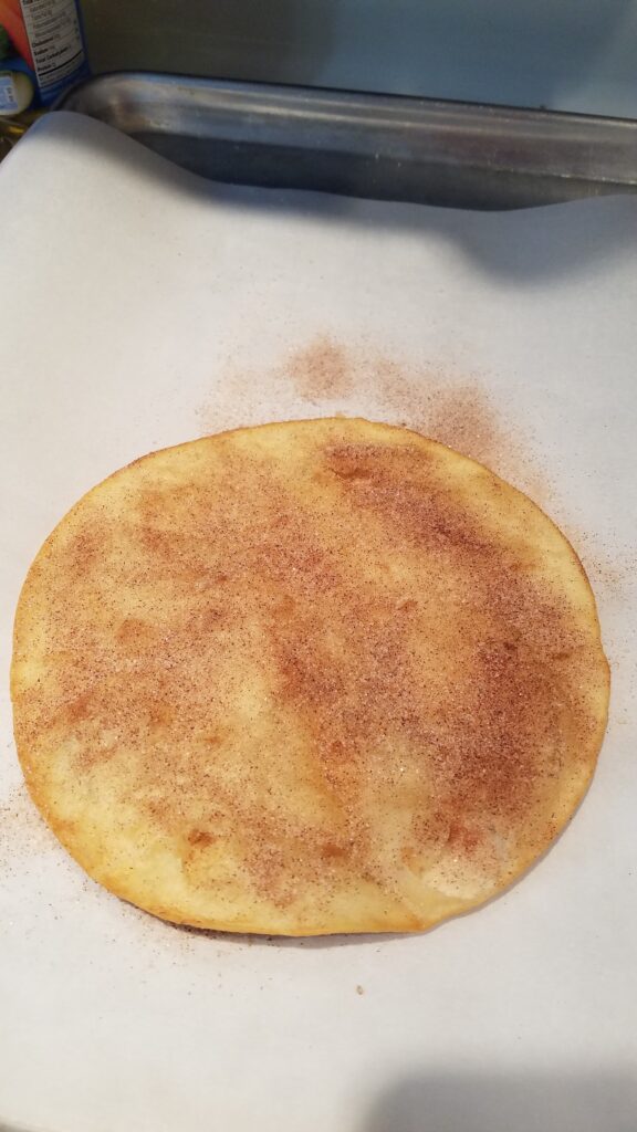 cinnamon sugar on a fried flour tortilla