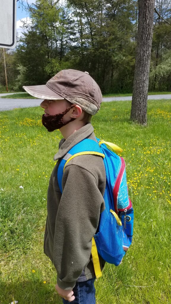 side view of yarn beard on child