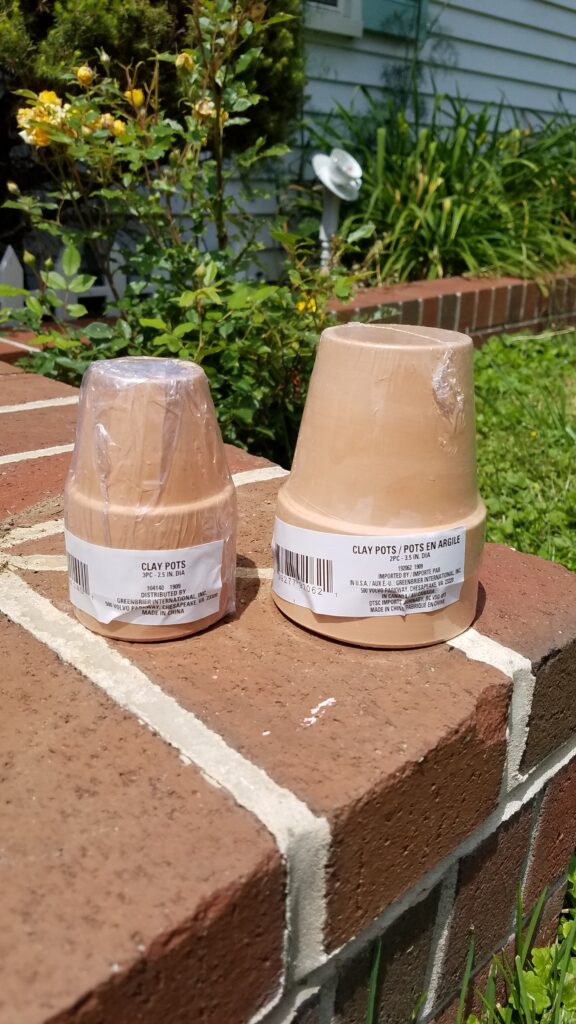 mini terra cotta pots from dollar tree in two different sizes