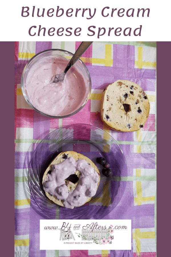 blueberry cream cheese spread in a bowl with some of it on a bagel slice on a glass plate, and another plain bagel slice on the table