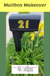 black mailbox with custom yellow numbers on it