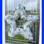 White star wreath with bright blue accents