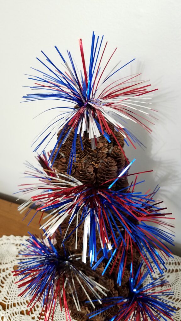 fireworks party picks on pine cone tree