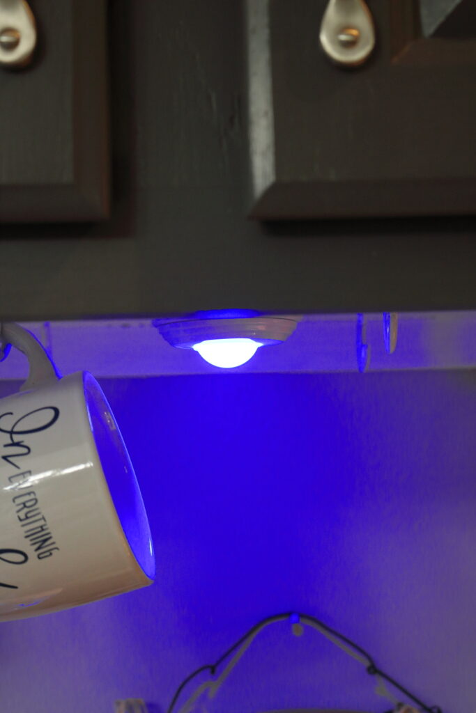 closeup of blue under cabinet light