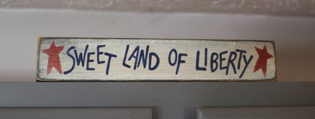 Sweet Land of Liberty sign