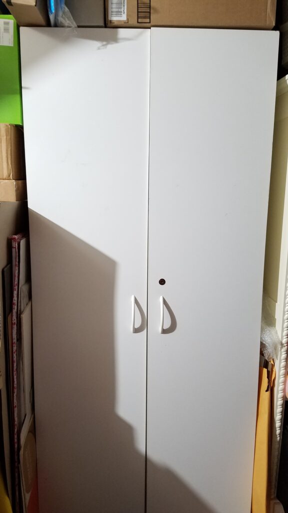 plain white cabinet with two doors