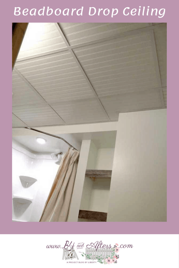 bathroom with a white beadboard drop ceiling