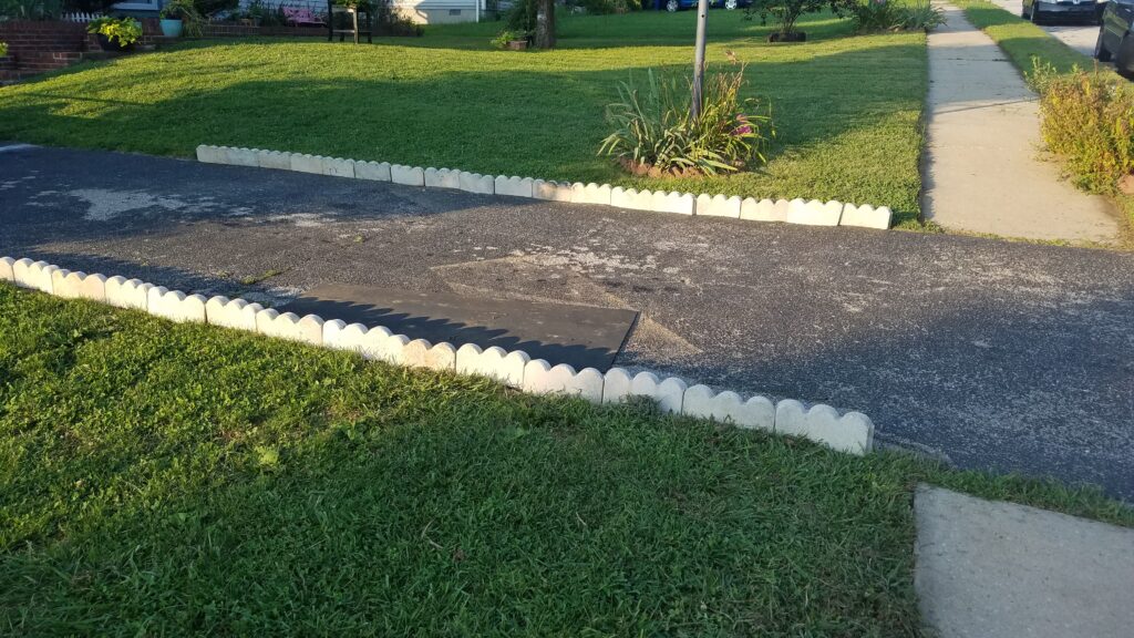 scalloped edging along the driveway