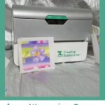 wrapping paper sticker with Xyron Creative Station Lite in the background