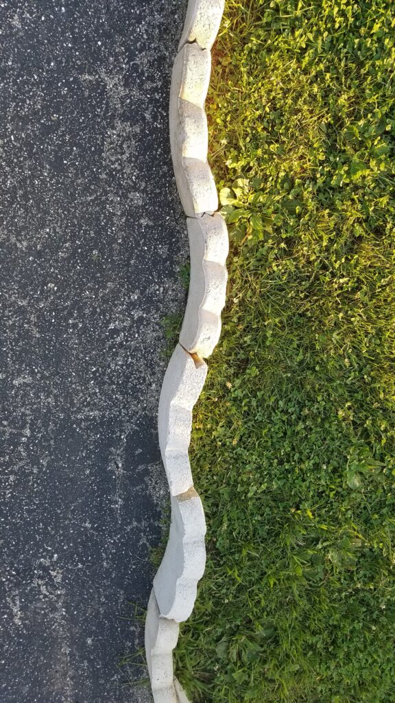 white scalloped brick edging