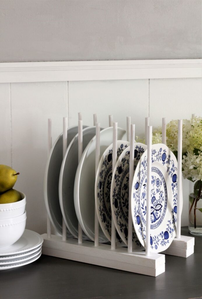 white DIY plate rack with blue and white plates