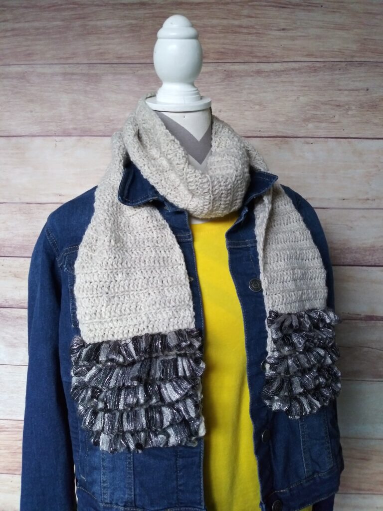 light gray scarf with scalloped edge