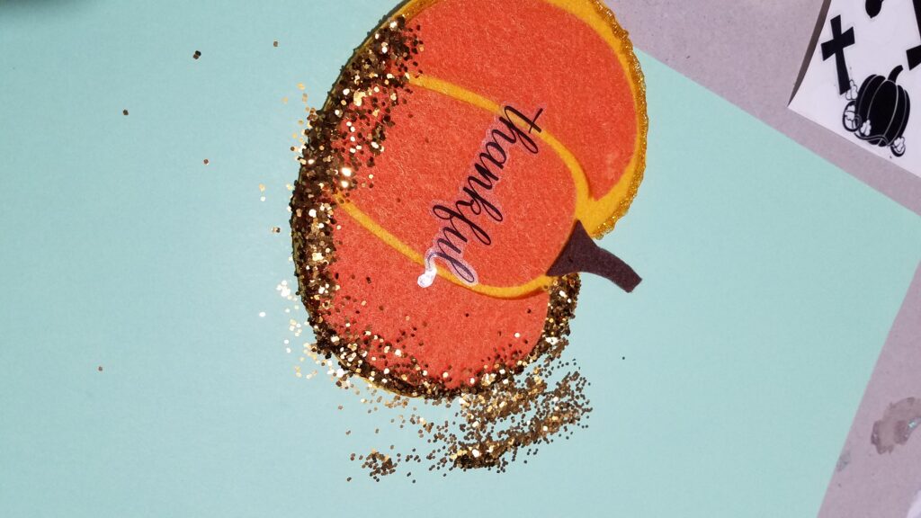 glitter on felt pumpkin