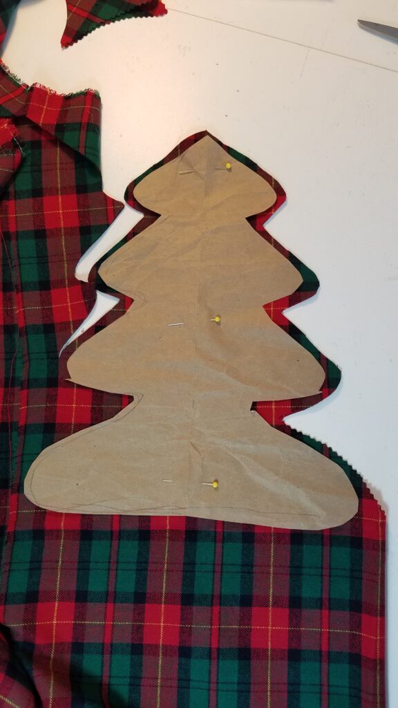 cutting out fabric for plaid Christmas tree