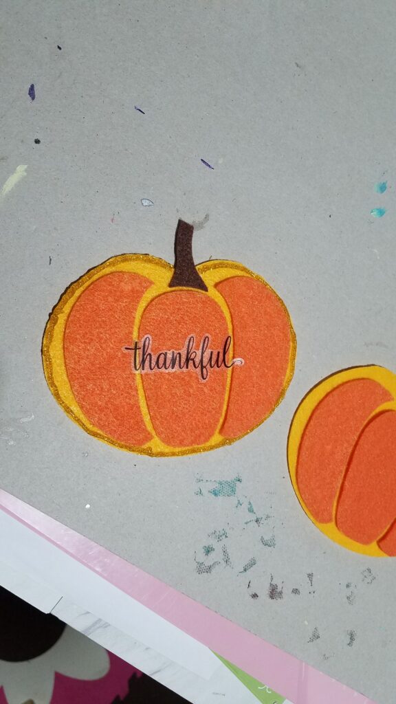 thankful sticker on felt pumpkin