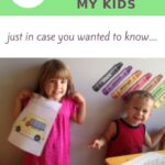 two small children doing preschool work
