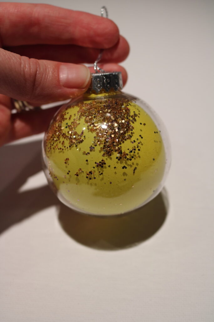 yellow balloon with glitter clear Christmas ornament idea