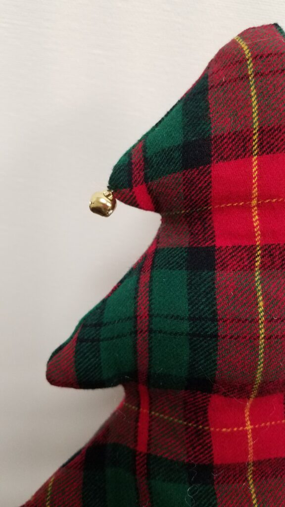 jingle bell on a fabric tree