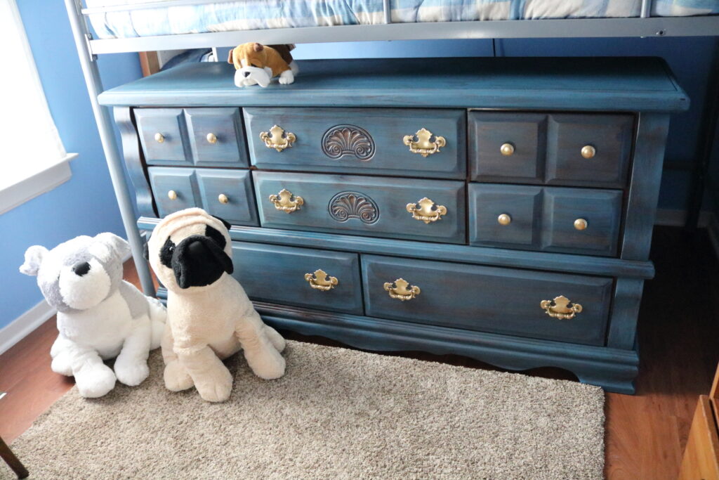 stuffed dogs with blue milk paint dresser