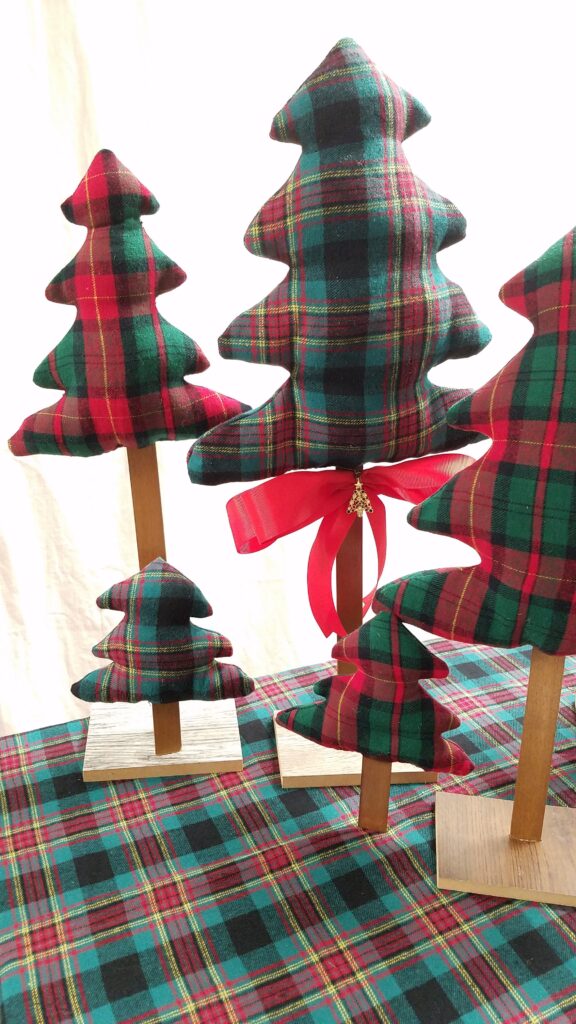 3 different sizes of fabric Christmas trees