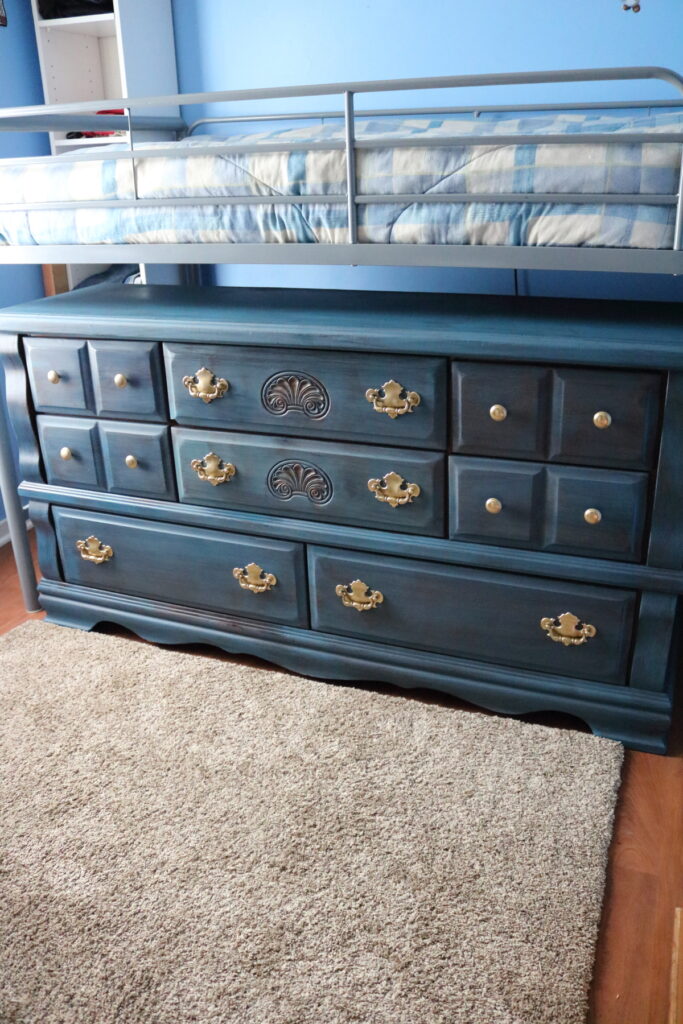 Blue dresser in a boy's room