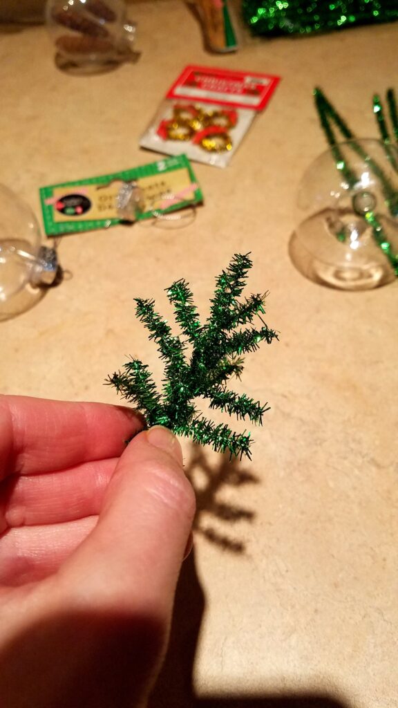 mini green tinsel Christmas tree