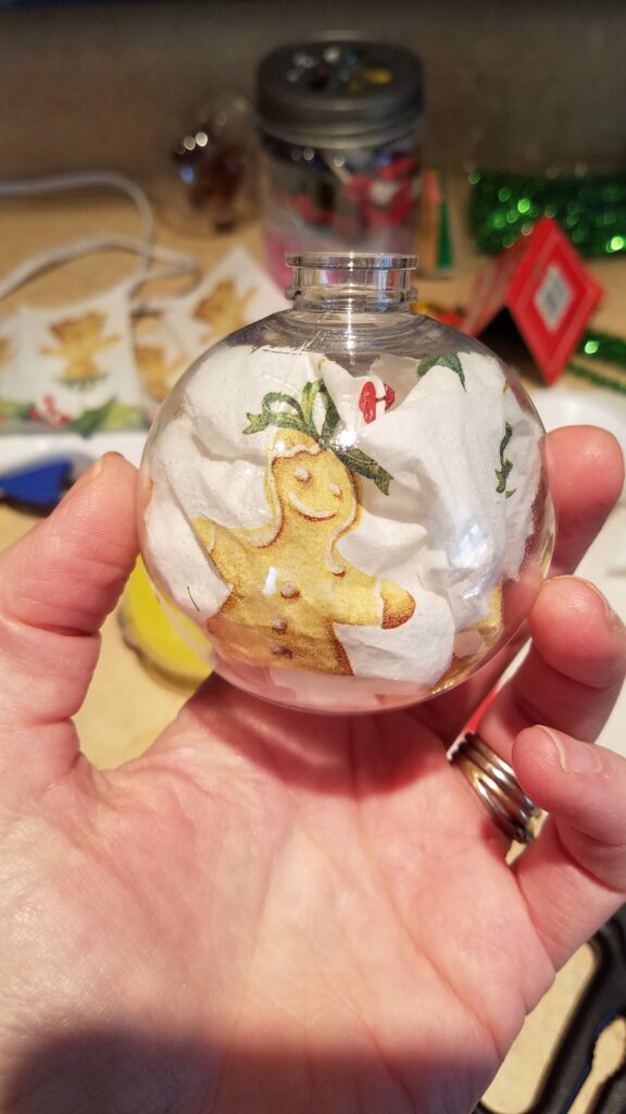 tissue inside clear Christmas ornament