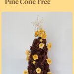 dried yellow roses on pine cone tree