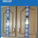 white snowmen on blue ribbon on gray cabinets