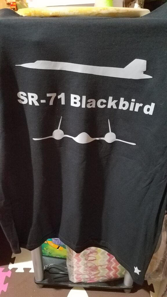 black tshirt with stealth airplane on it